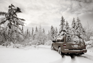 A sturdy SUVs navigating snowy terrain in Cheyenne WY showcasing its capability in harsh winter conditions